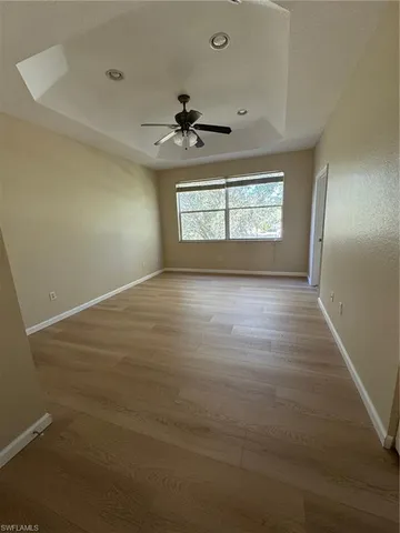 a bathroom with a sink toilet vanity and shower