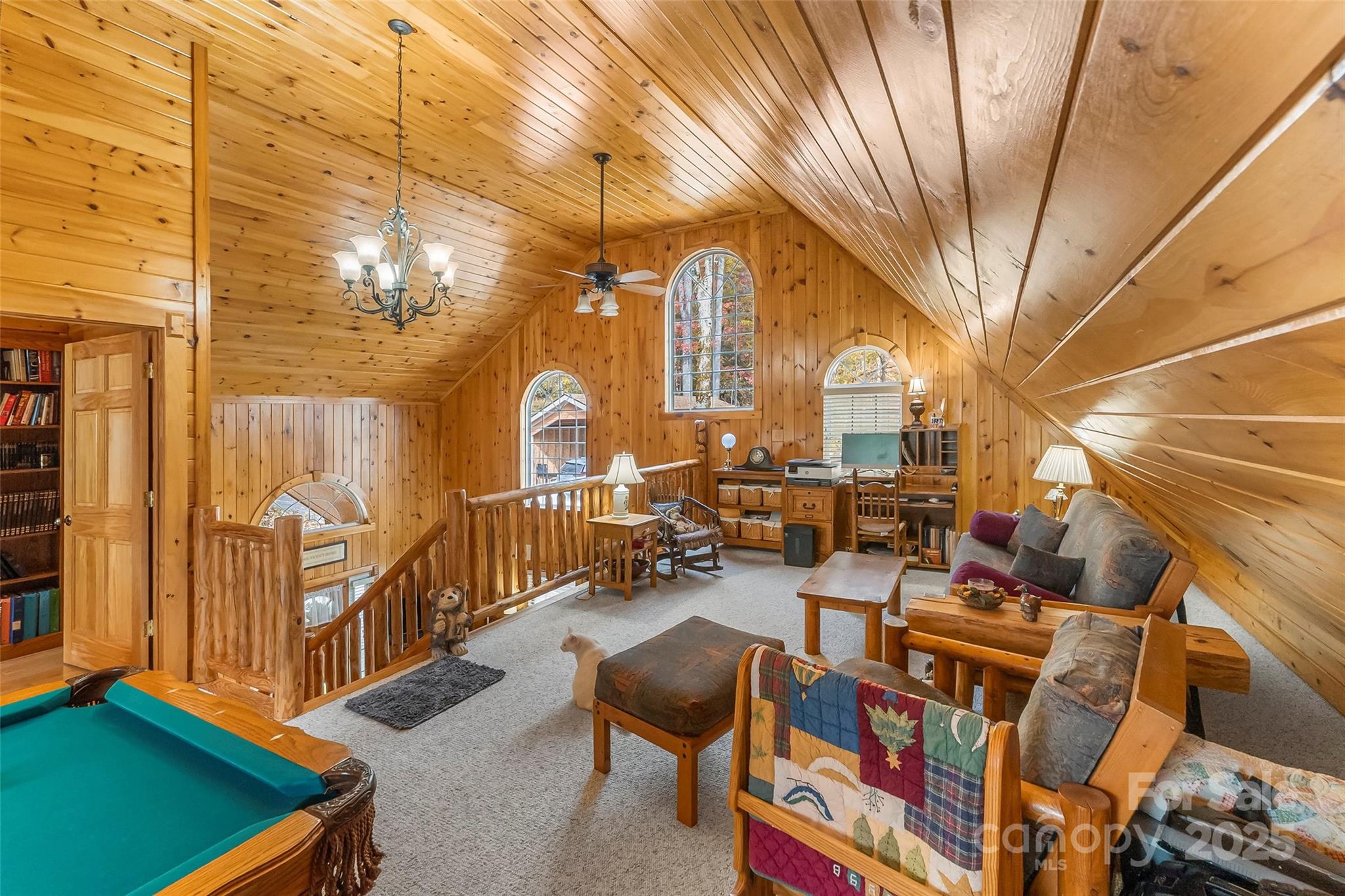 6151 Hemlock Road Newland, NC 28657 - Photo 15 of 43 a living room with furniture and a chandelier
