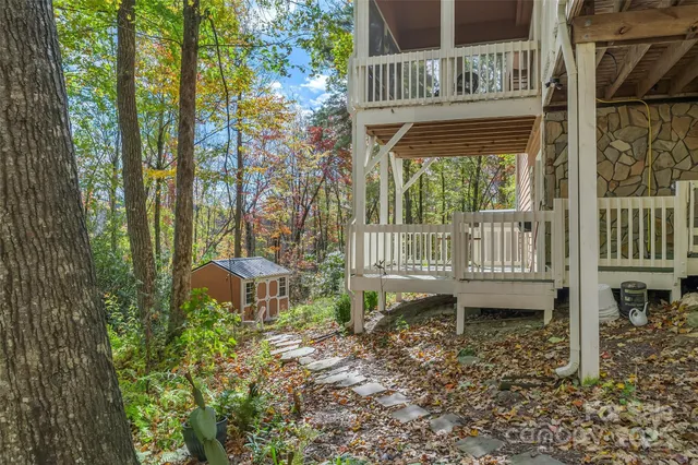 a view of a park with large trees