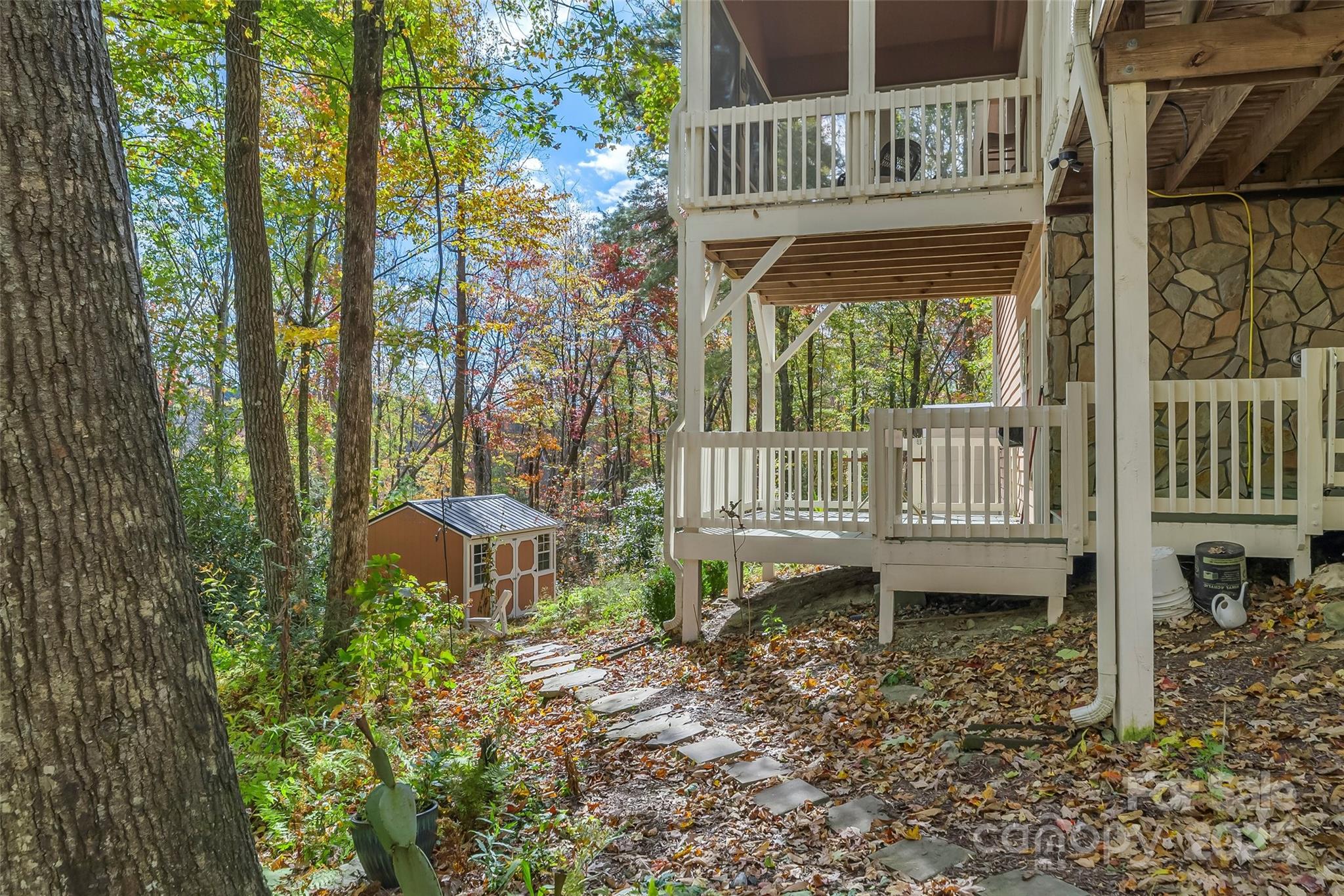 6151 Hemlock Road Newland, NC 28657 - Photo 31 of 43 a view of a house with backyard and sitting area