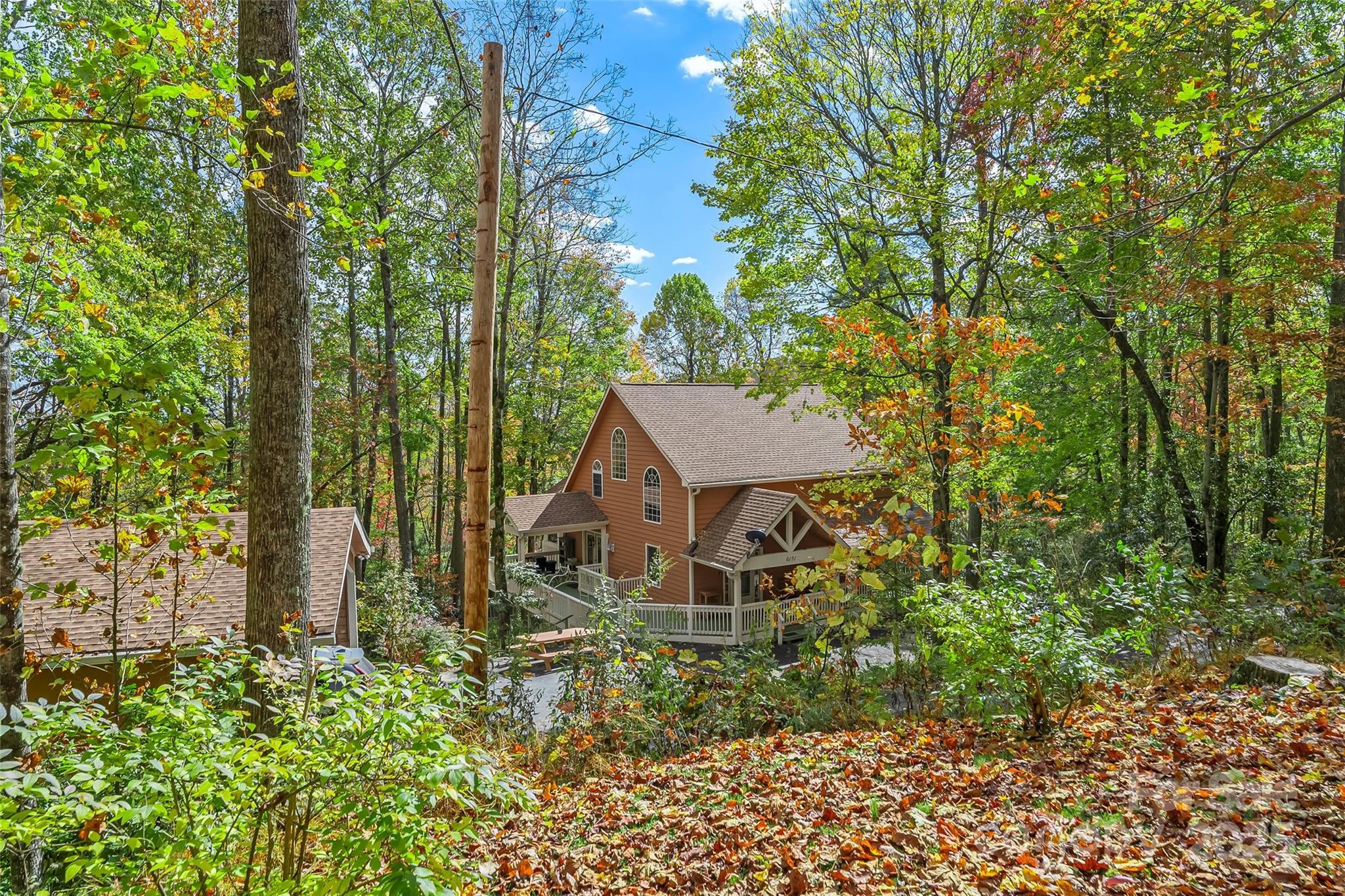 6151 Hemlock Road Newland, NC 28657 - Photo 35 of 43 front view of a house with a yard