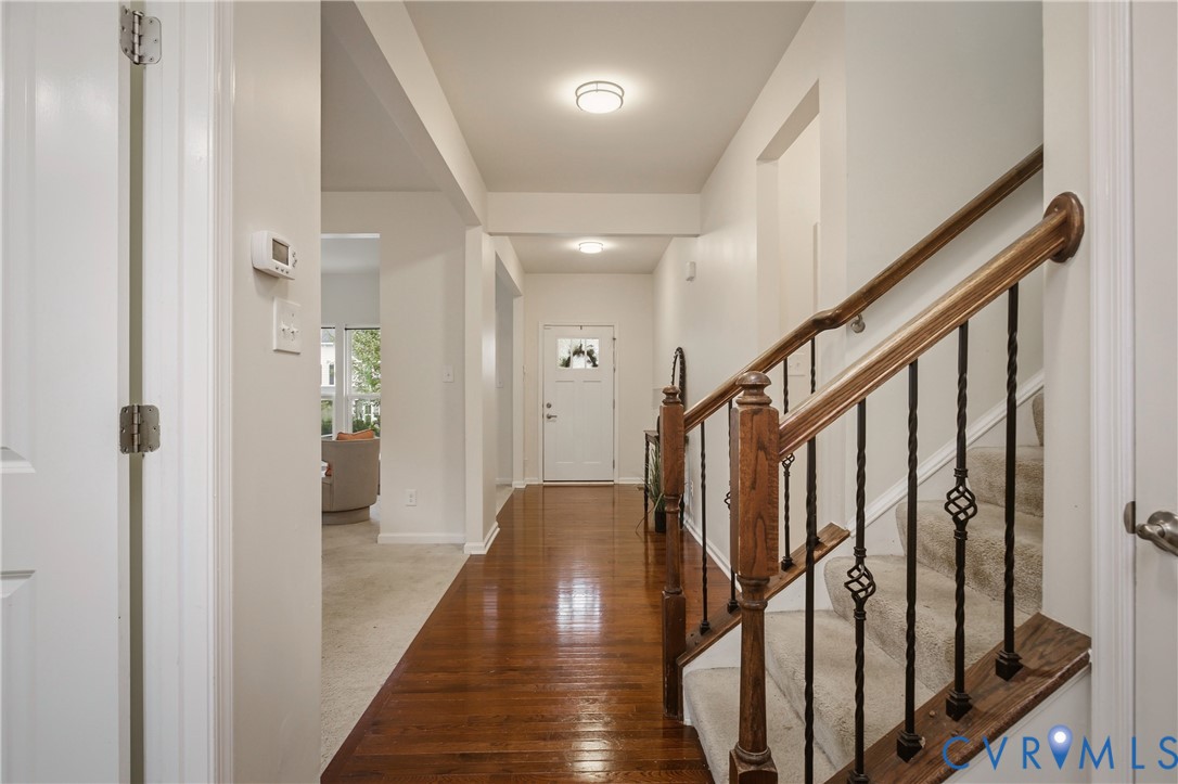 9013 Bailey Hill Road Midlothian, VA 23112 - Photo 15 of 56 Entryway featuring wood-finish flooring, a carpete