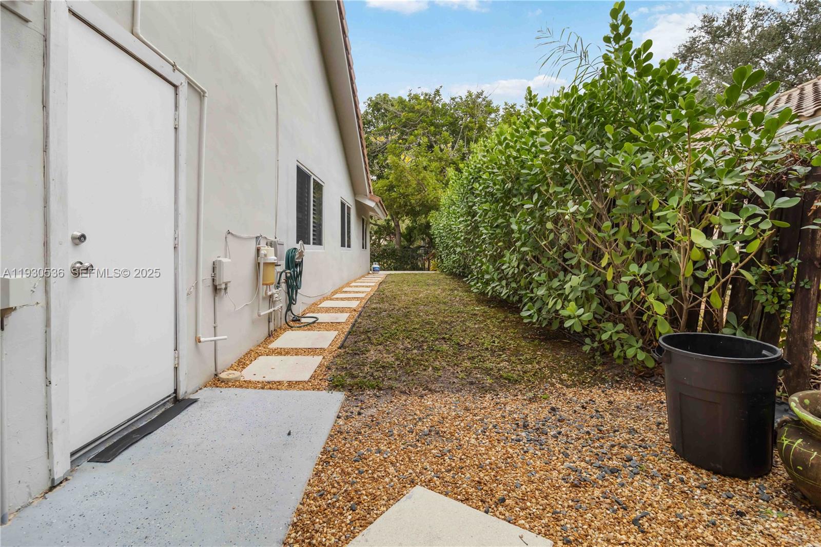 2047 Southwest 36th Avenue Delray Beach, FL 33445 - Photo 36 of 45 a view of a back yard of the house