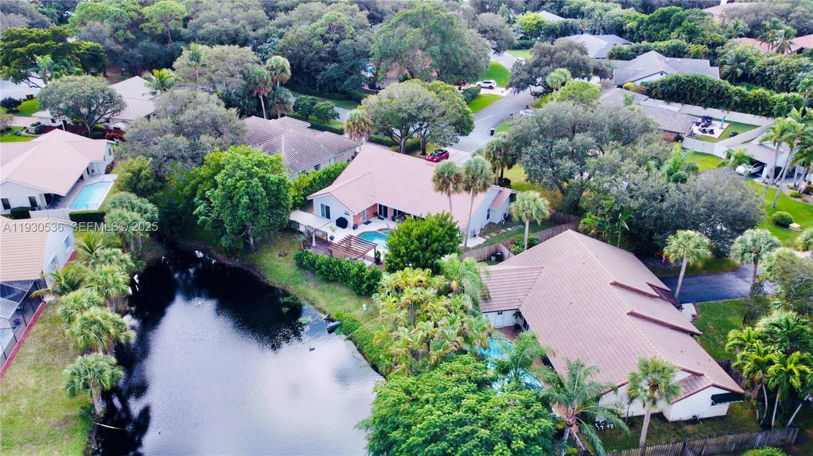 2047 Southwest 36th Avenue Delray Beach, FL 33445 - Photo 42 of 45 an aerial view of a houses with outdoor space and street view
