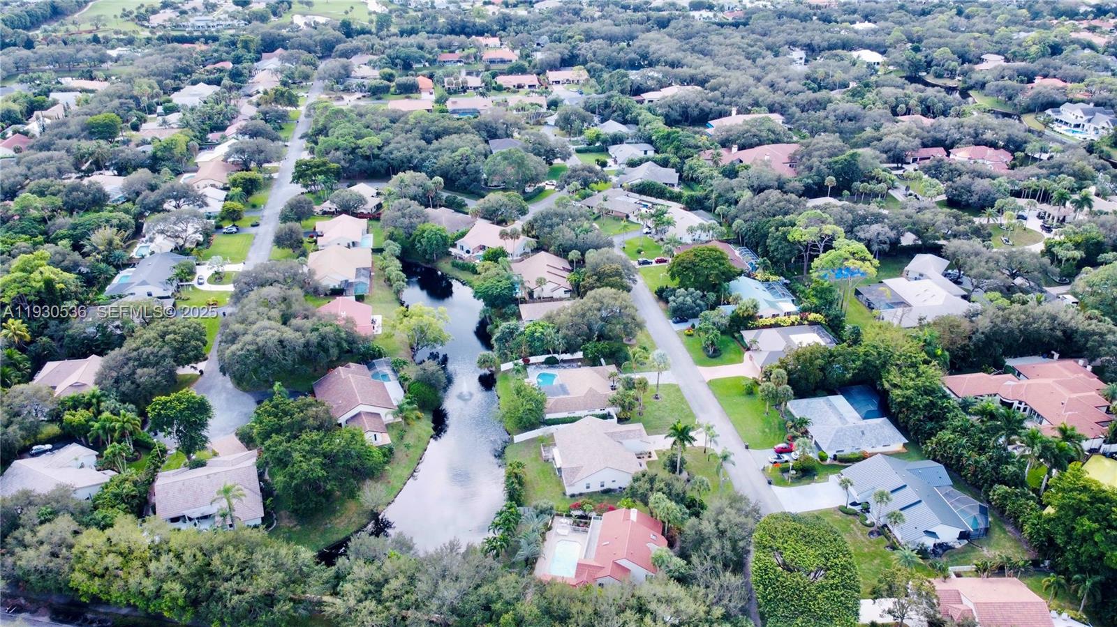 2047 Southwest 36th Avenue Delray Beach, FL 33445 - Photo 45 of 45 an aerial view of residential houses with outdoor space