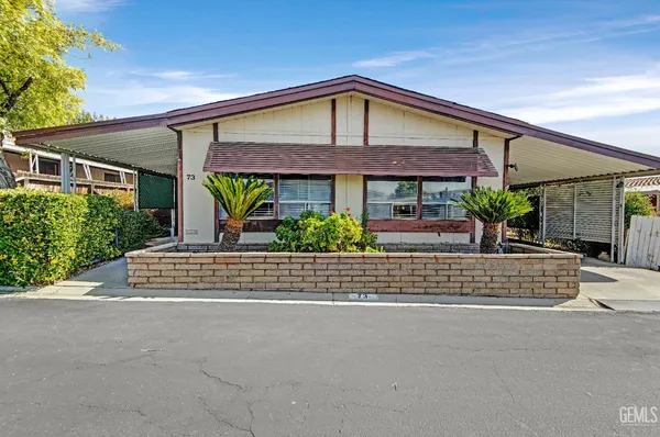 front view of a house with a street