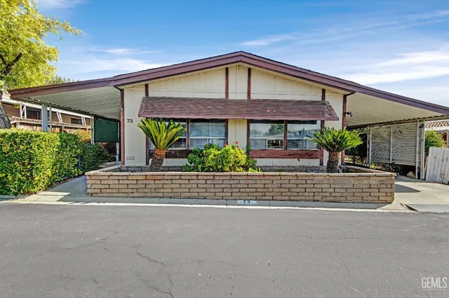 front view of a house with a street