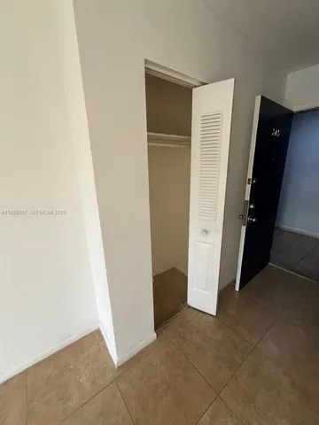 a view of a living room with furniture