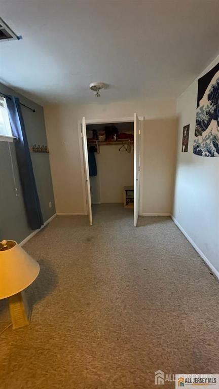 102 Gracey Street Edison, NJ 08817 - Photo 12 of 16 a view of an empty room and a window