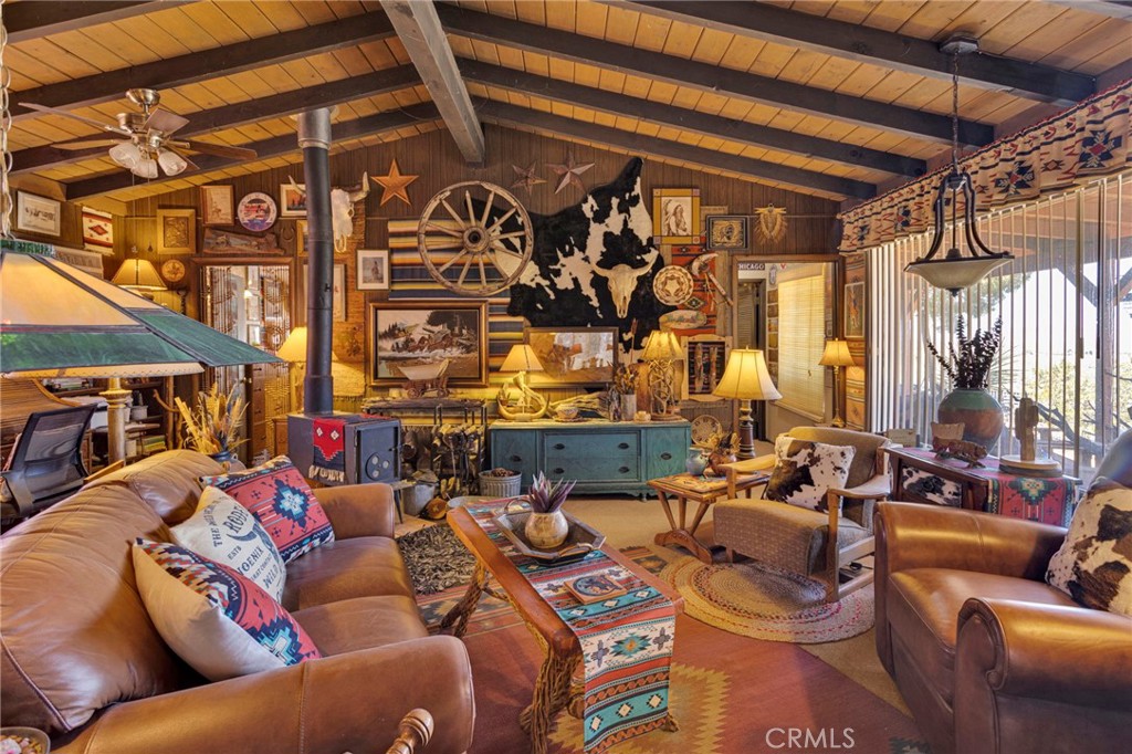 29229 Santa Rosa Road Lucerne Valley, CA 92356 - Photo 22 of 74 a living room with blue lights with furniture