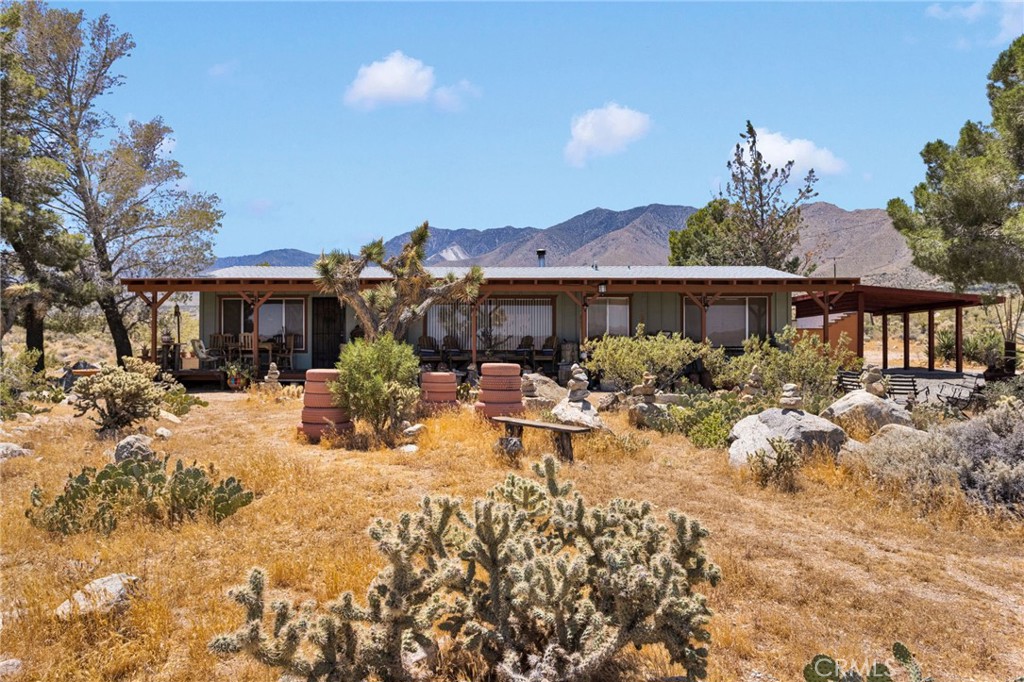29229 Santa Rosa Road Lucerne Valley, CA 92356 - Photo 4 of 74 a view of a house with yard and sitting area