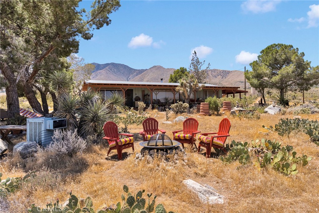 29229 Santa Rosa Road Lucerne Valley, CA 92356 - Photo 6 of 74 a view of a table and chairs in the patio