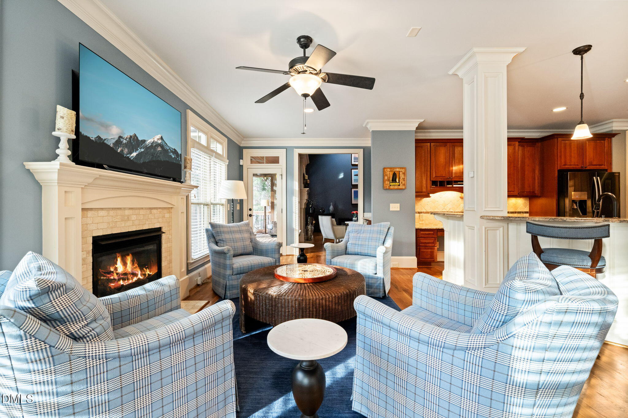 12313 The Gates Drive Raleigh, NC 27614 - Photo 15 of 78 a living room with furniture a fireplace and a flat screen tv