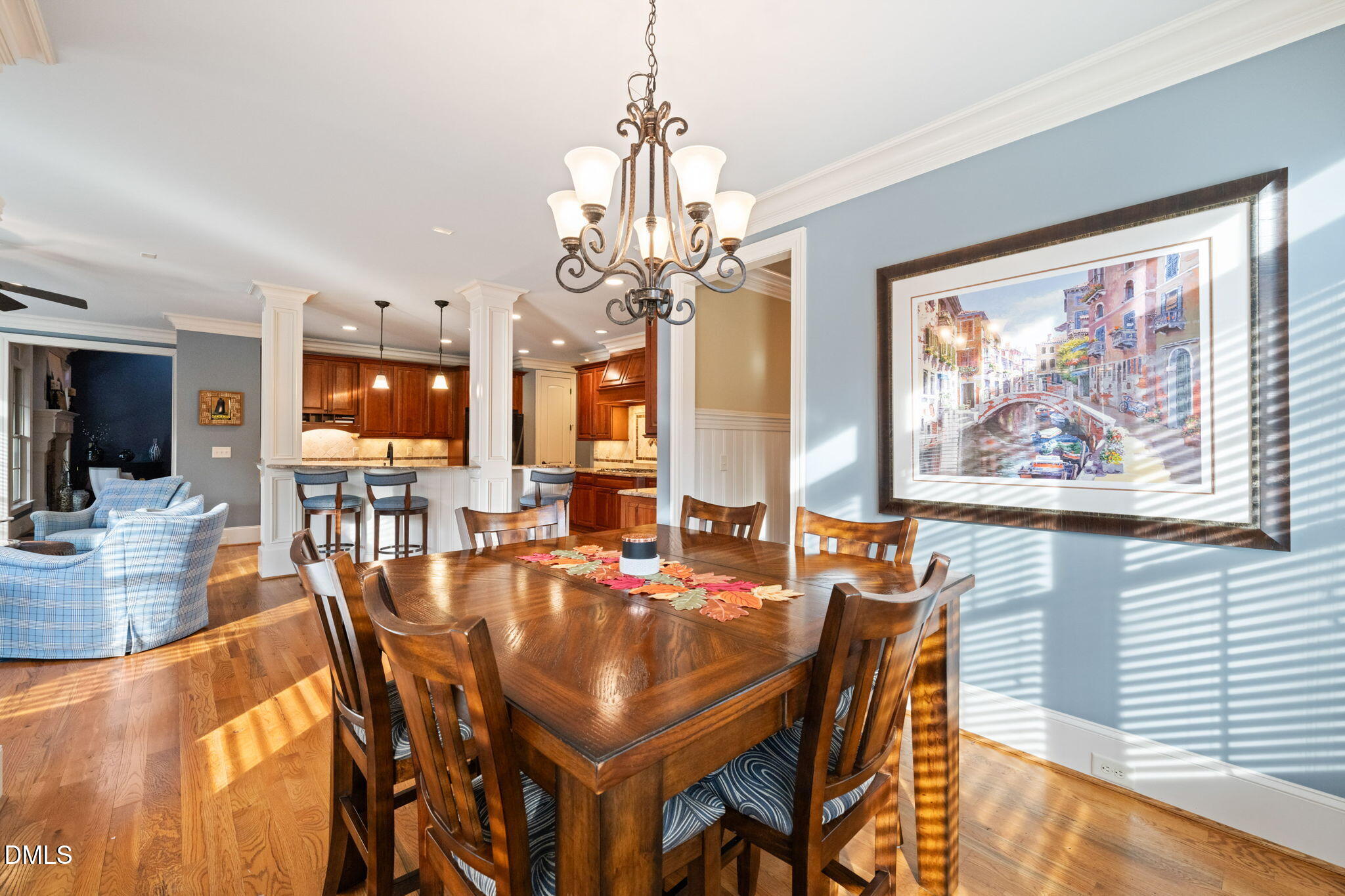 12313 The Gates Drive Raleigh, NC 27614 - Photo 22 of 78 a dining room with furniture a large window and wooden floor