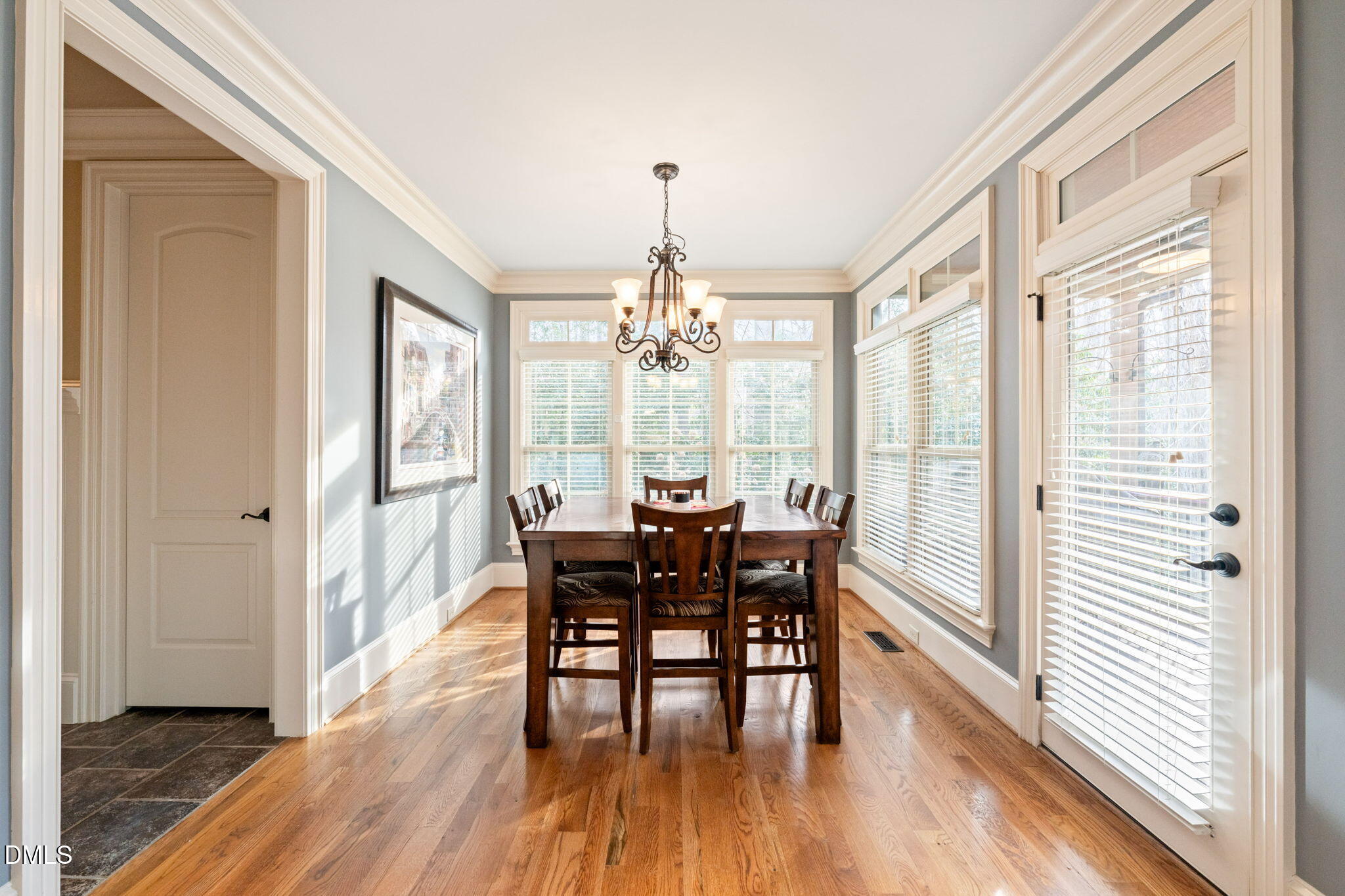 12313 The Gates Drive Raleigh, NC 27614 - Photo 23 of 78 a view of a dining room with furniture window and wooden floor