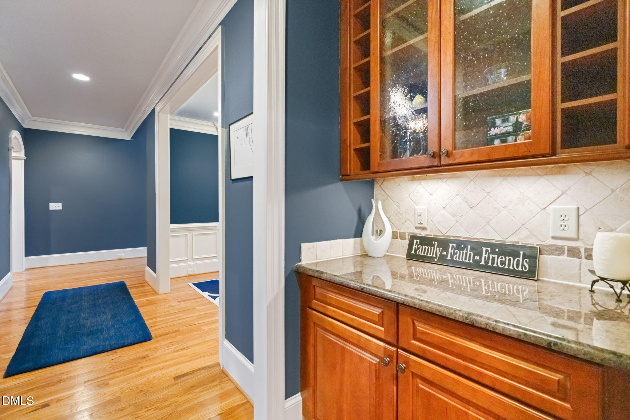 12313 The Gates Drive Raleigh, NC 27614 - Photo 4 of 78 a hallway with mirror and furniture