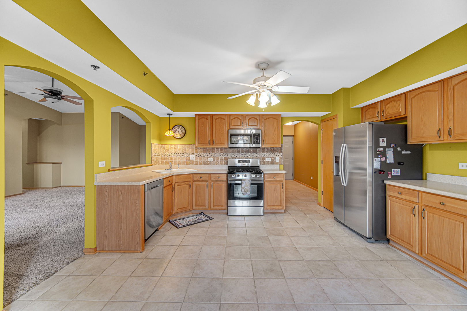 7920 Trinity Circle, Unit 4SW Tinley Park, IL 60487 - Photo 13 of 30 a kitchen with a sink appliances and cabinets