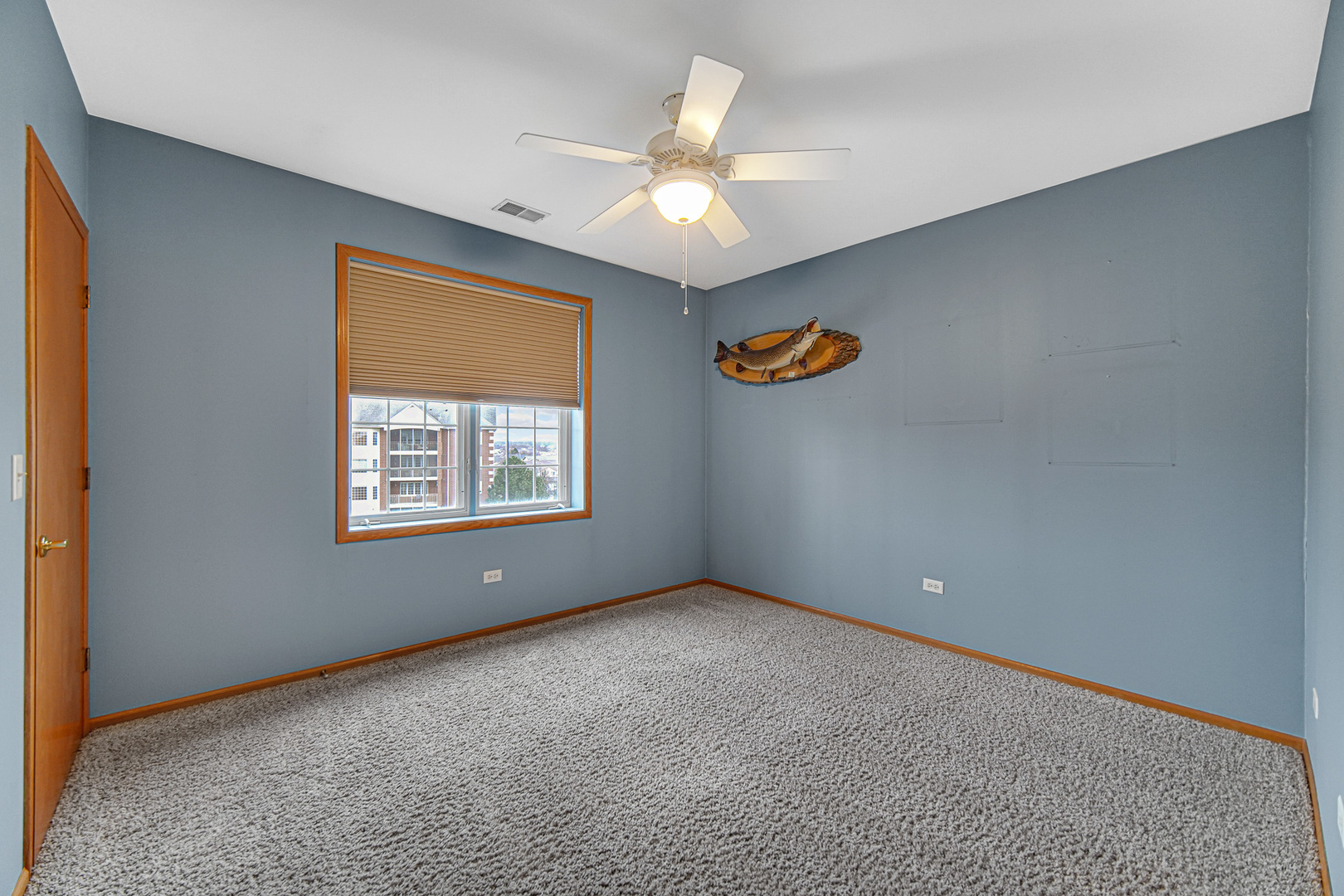 7920 Trinity Circle, Unit 4SW Tinley Park, IL 60487 - Photo 15 of 30 an empty room with windows and ceiling fan