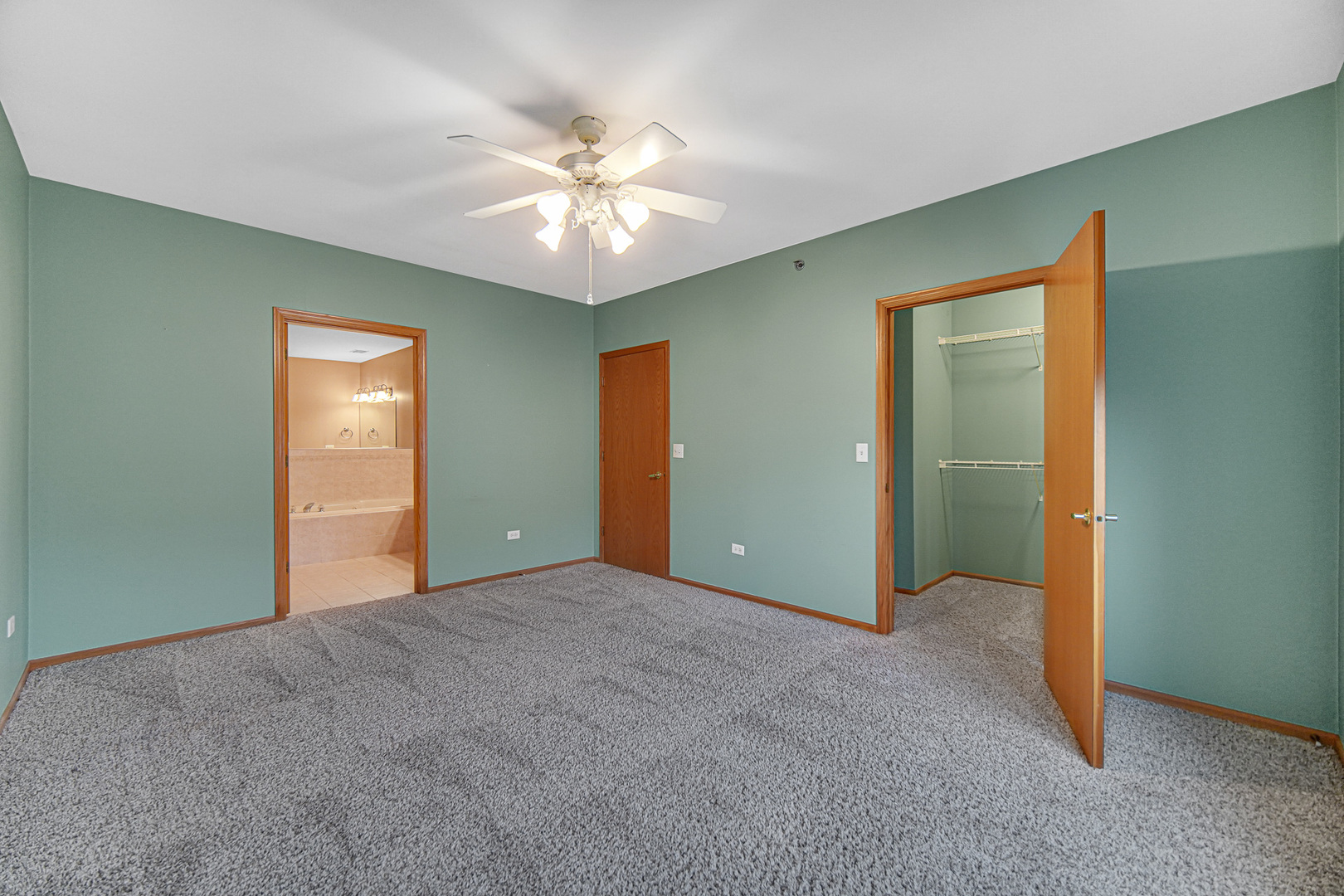 7920 Trinity Circle, Unit 4SW Tinley Park, IL 60487 - Photo 20 of 30 a view of an empty room with a fan