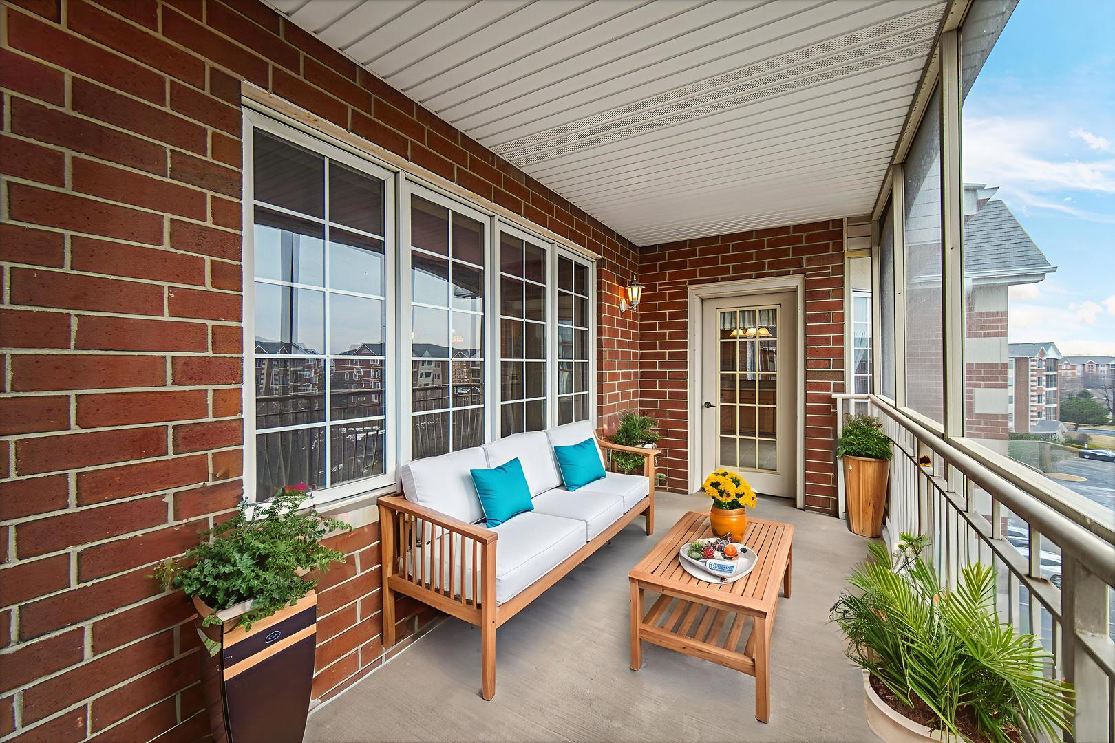7920 Trinity Circle, Unit 4SW Tinley Park, IL 60487 - Photo 27 of 30 a balcony with furniture and garden view
