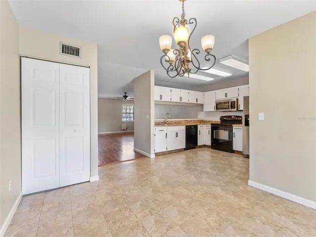a view of a kitchen with a sink