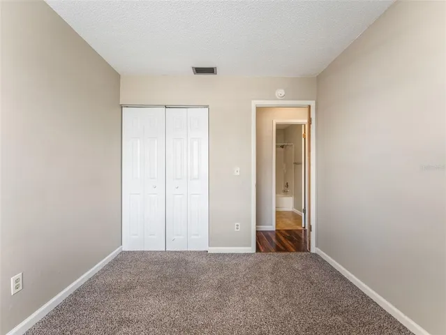 an empty room with closet