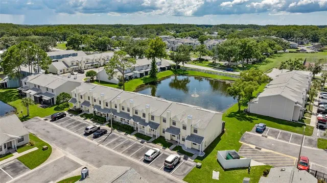 an aerial view of a house with a garden
