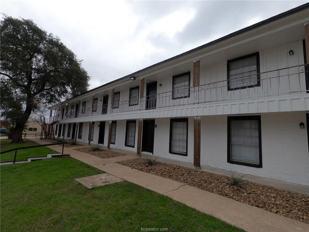 3300 South College Avenue, Unit A05 Bryan, TX 77801 - Photo 1 of 15 a view of a house with a yard
