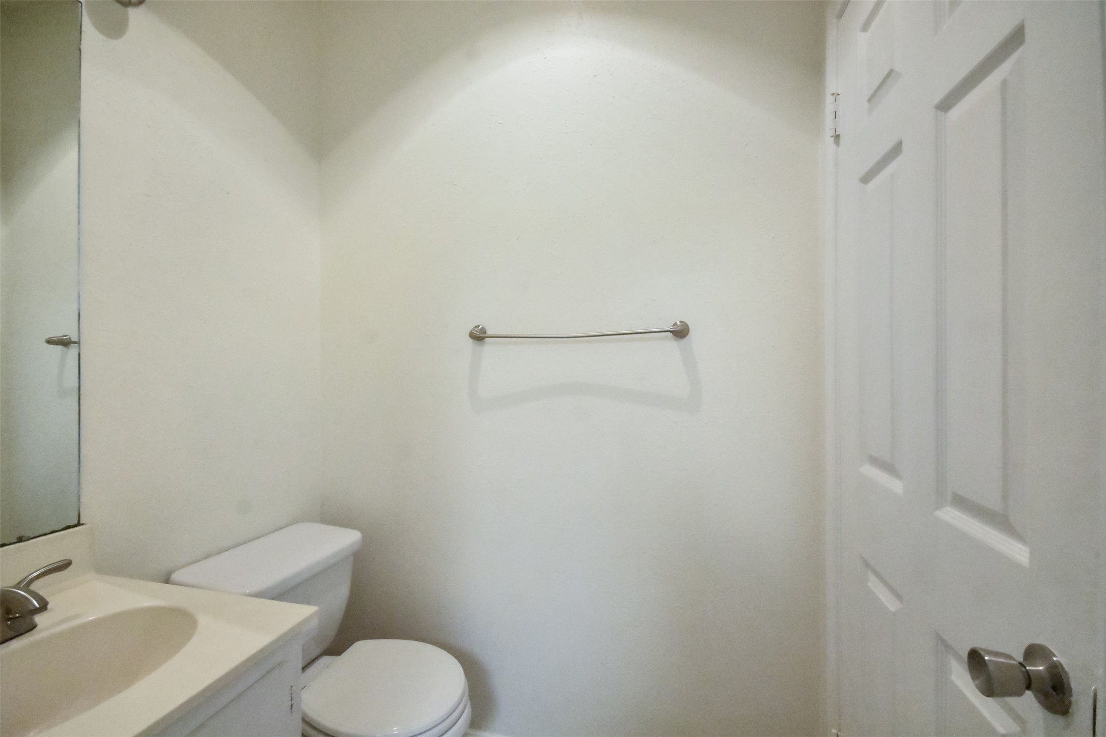 2529 Rio Grande Street, Unit 85 Austin, TX 78705 - Photo 12 of 31 a white toilet sitting next to a bathroom sink