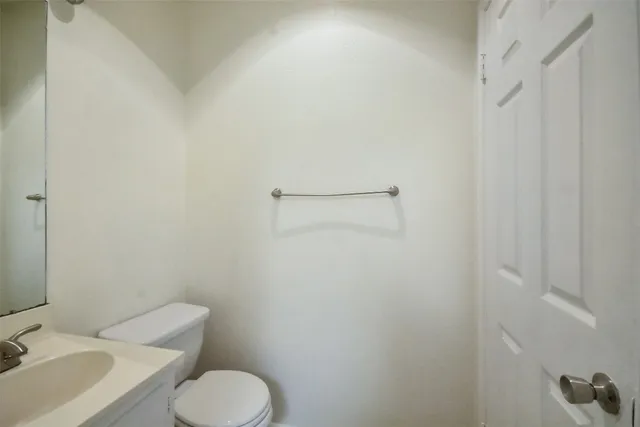 a view of bathroom with a toilet sink and tub