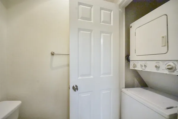 a view of bathroom with a toilet sink and tub
