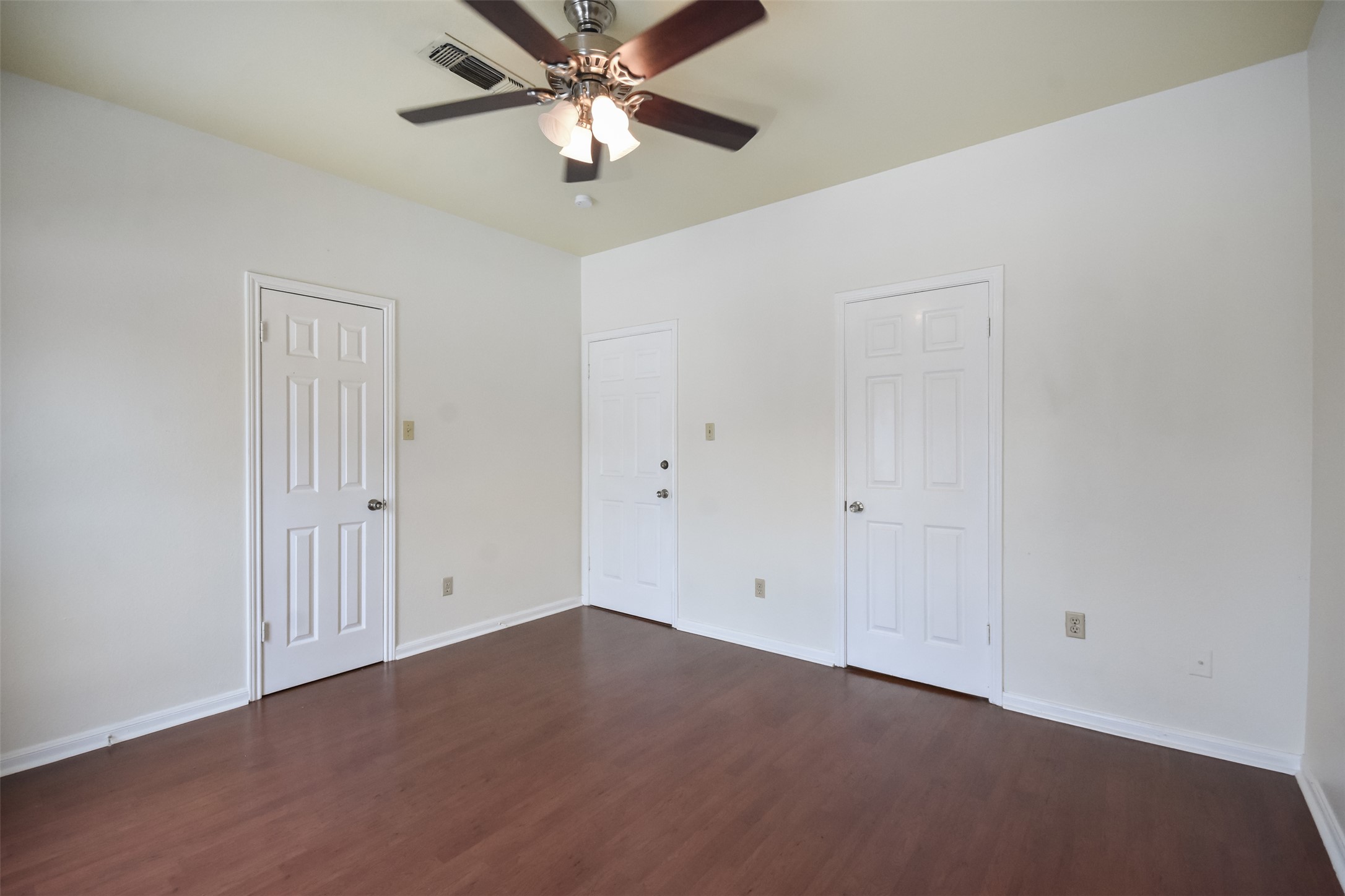 2529 Rio Grande Street, Unit 85 Austin, TX 78705 - Photo 16 of 31 an empty room with a ceiling fan and closet area