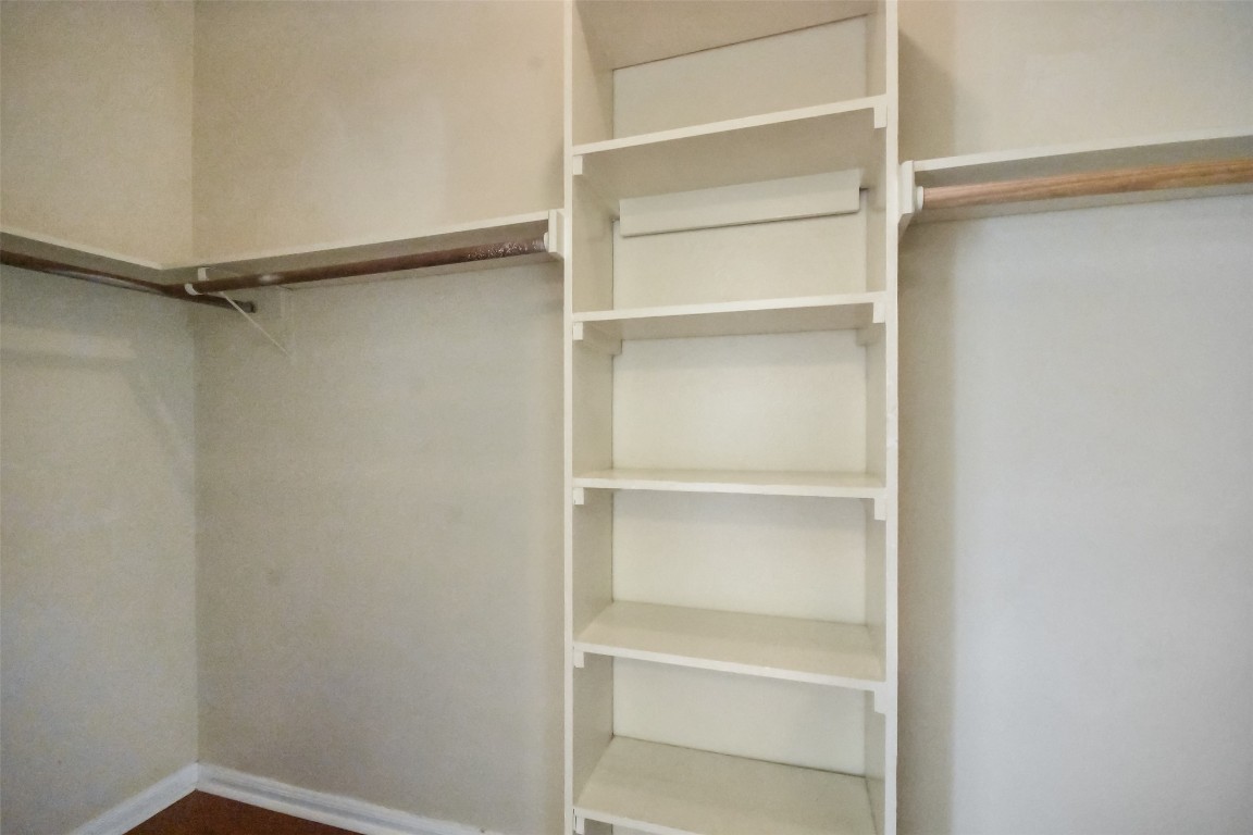 2529 Rio Grande Street, Unit 85 Austin, TX 78705 - Photo 17 of 31 a view of walk in closet with empty racks