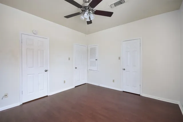 a bathroom with a sink toilet and vanity