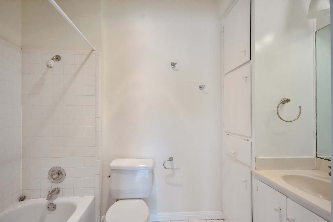 2529 Rio Grande Street, Unit 85 Austin, TX 78705 - Photo 22 of 31 a bathroom with a sink toilet and shower