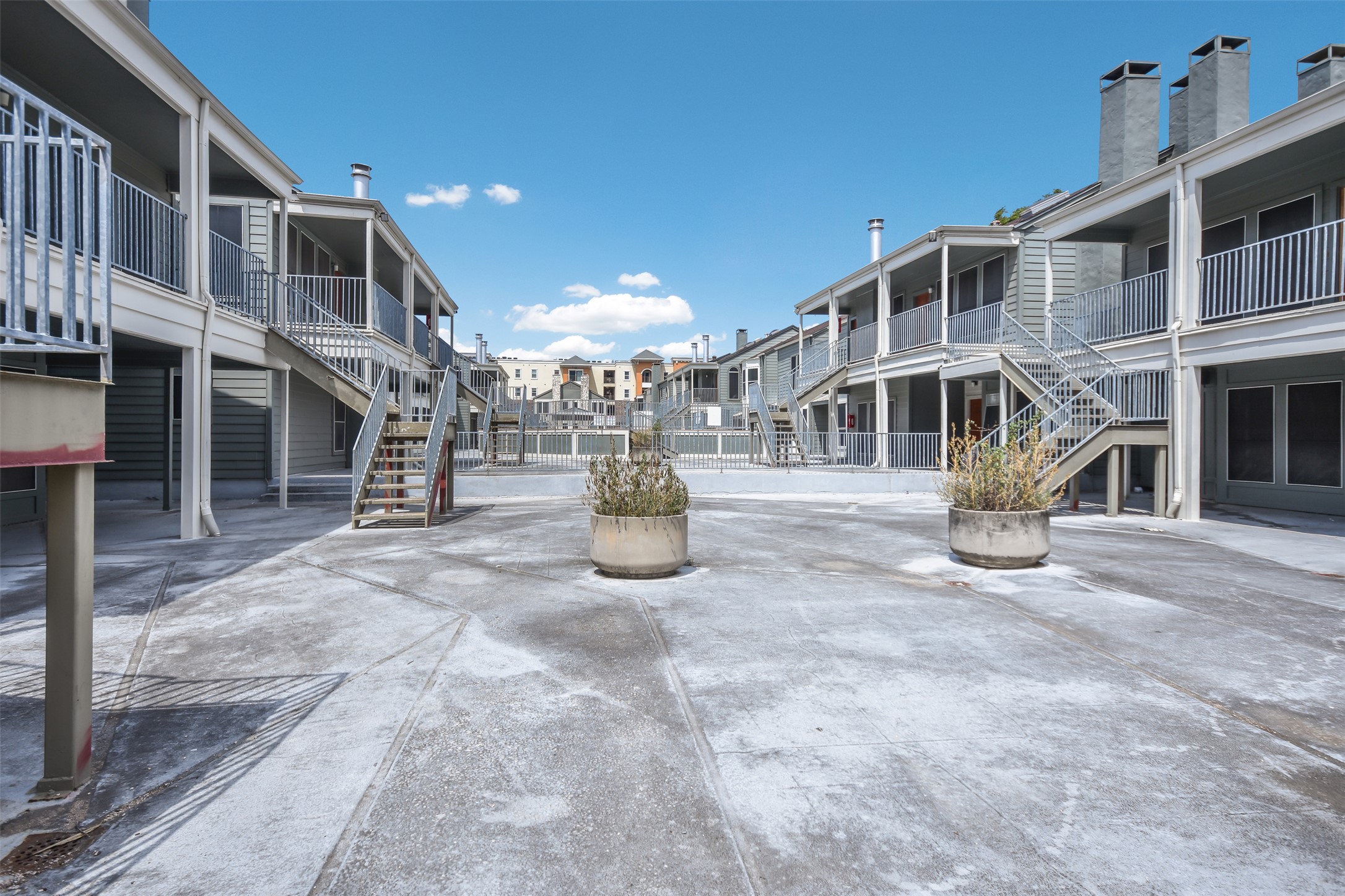 2529 Rio Grande Street, Unit 85 Austin, TX 78705 - Photo 25 of 31 a view of a building with a yard