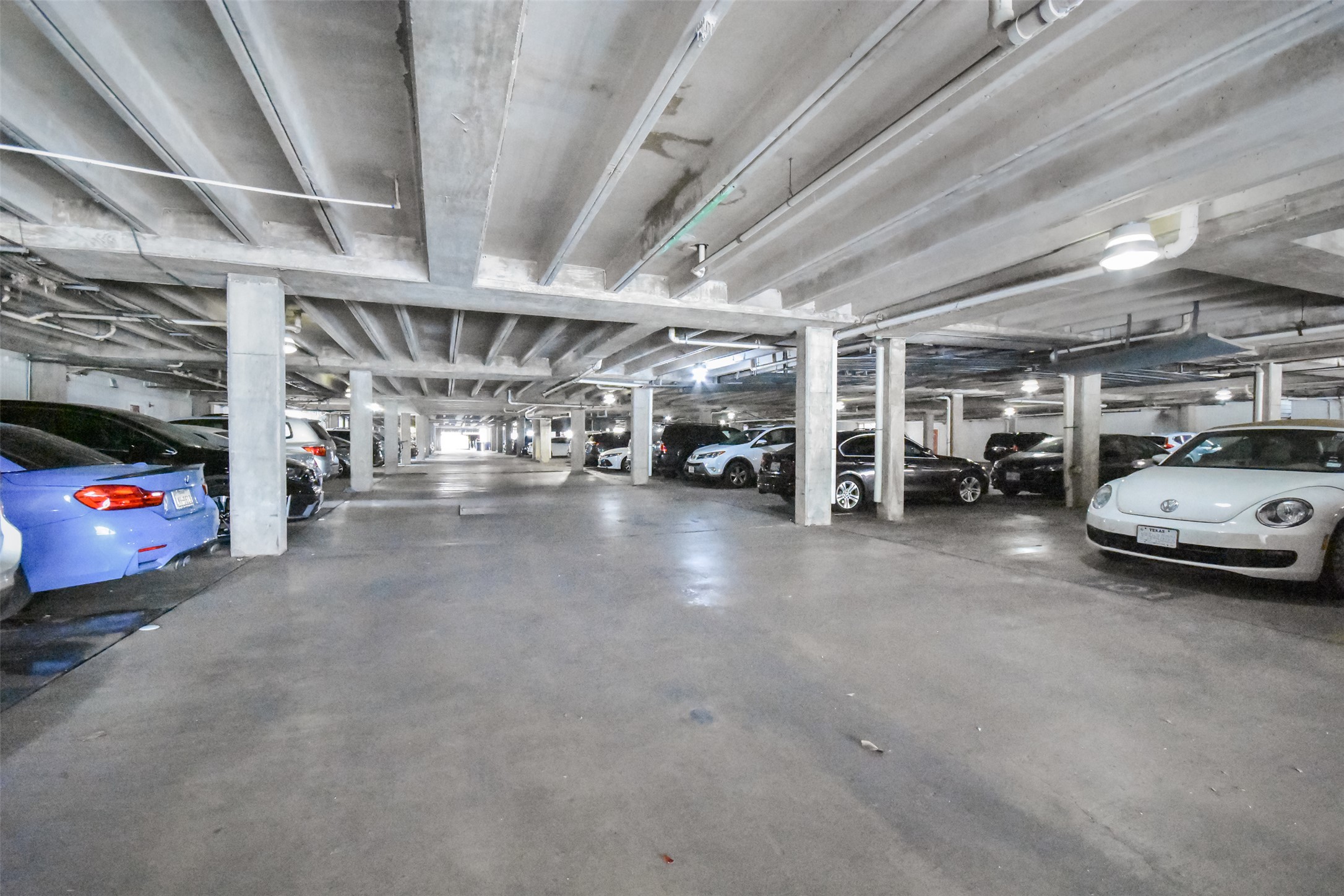 2529 Rio Grande Street, Unit 85 Austin, TX 78705 - Photo 31 of 31 a view of parking area with garage