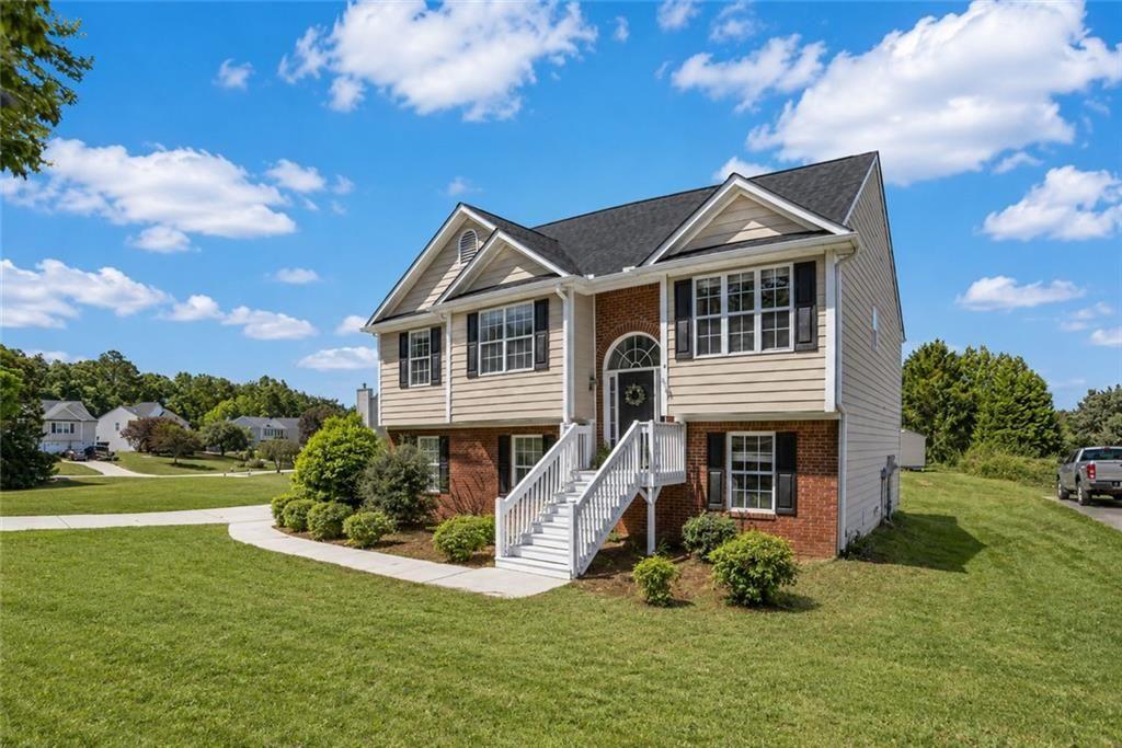 9720 Poole Road Villa Rica, GA 30180 - Photo 31 of 40 a front view of a house with a yard