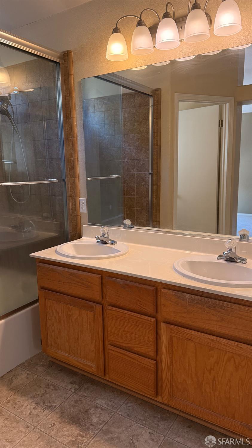 1804 Shadowcliff Way Brentwood, CA 94513 - Photo 29 of 34 a bathroom with a sink and a mirror