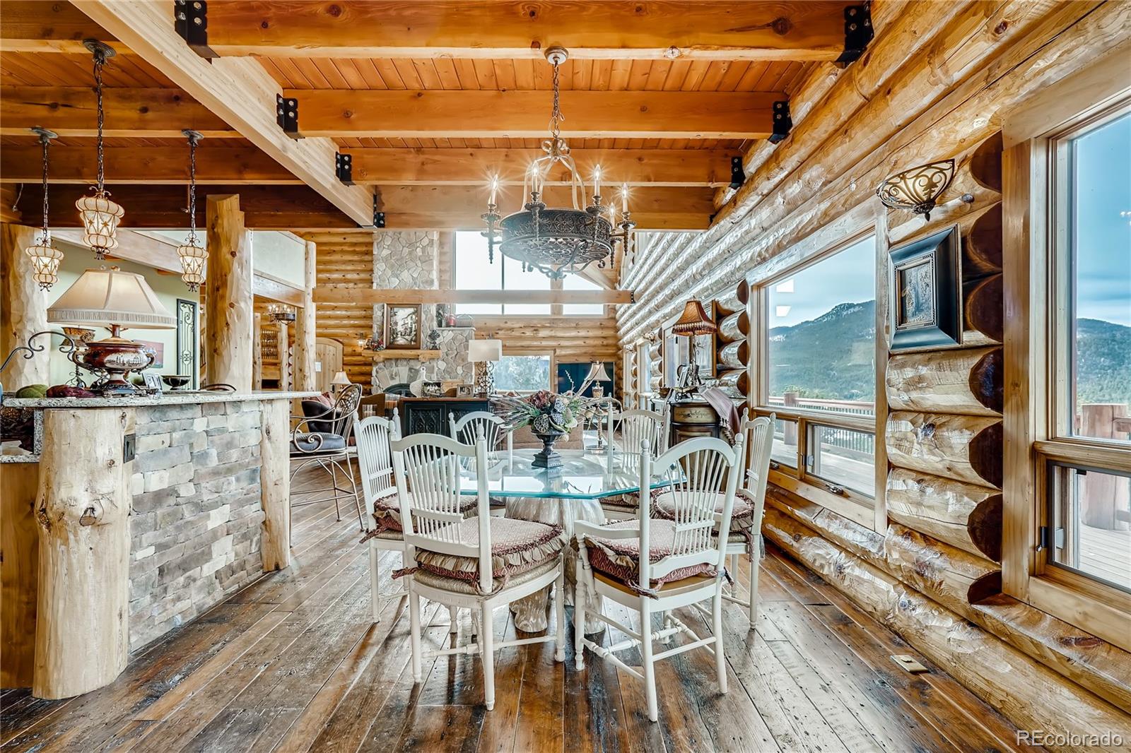 11200 Shimley Road Golden, CO 80403 - Photo 13 of 40 a view of a dining room with furniture window and outside view