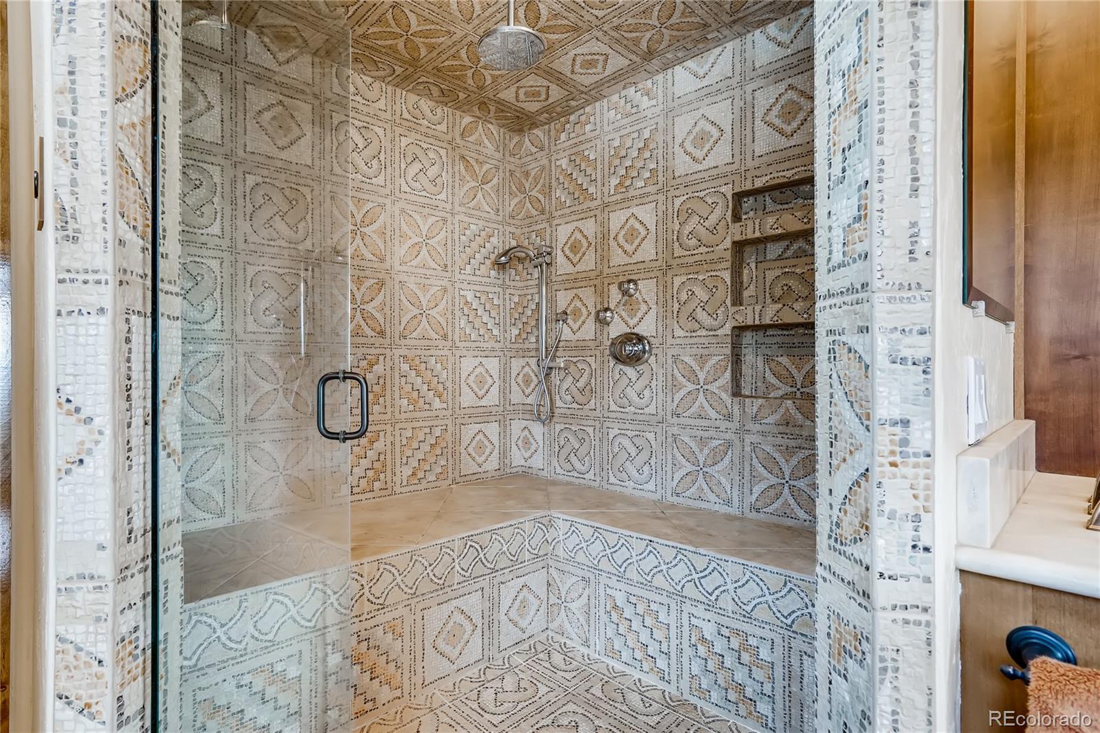 11200 Shimley Road Golden, CO 80403 - Photo 23 of 40 a bathroom with a shower