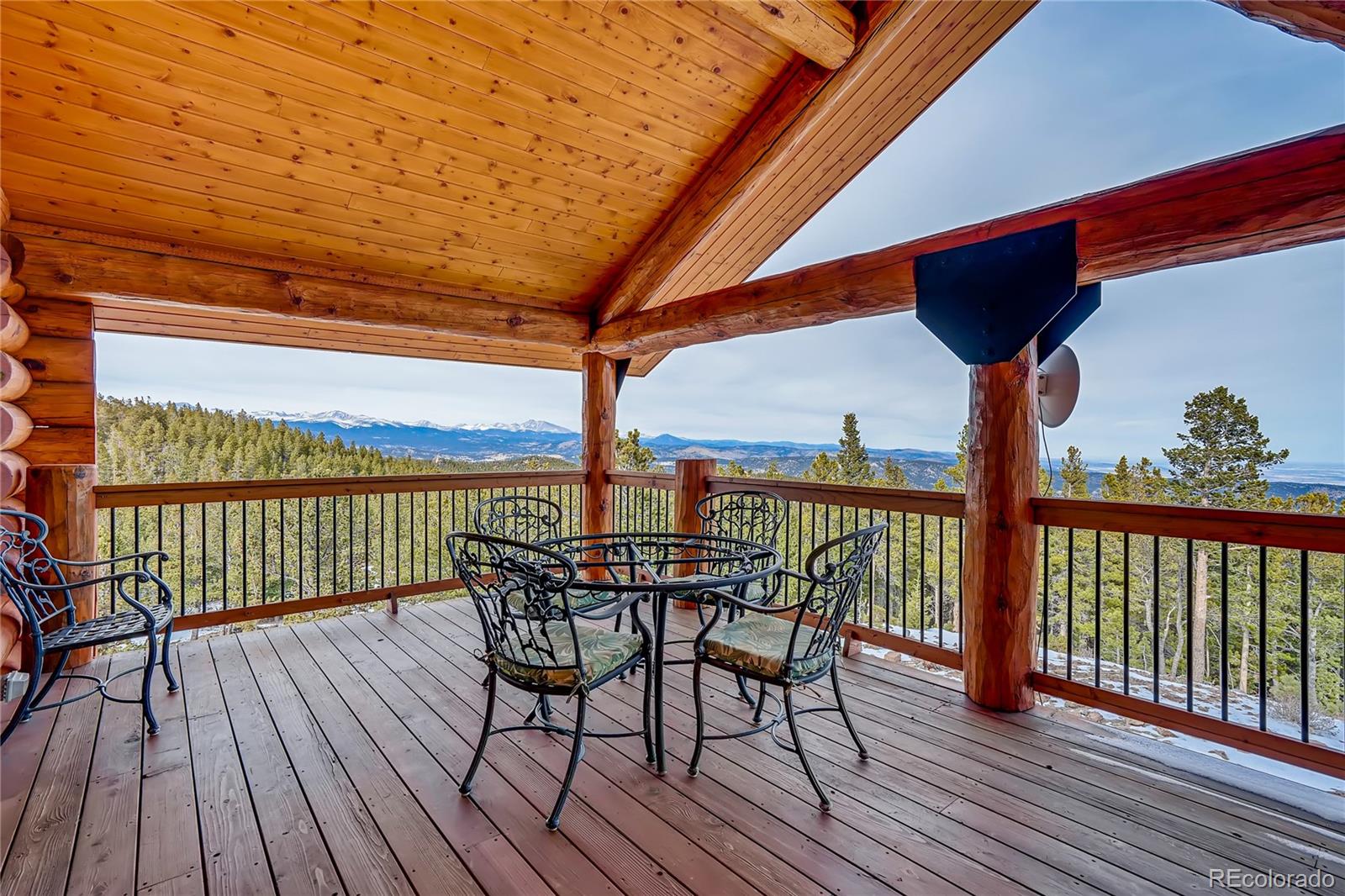 11200 Shimley Road Golden, CO 80403 - Photo 24 of 40 a view of a balcony with furniture