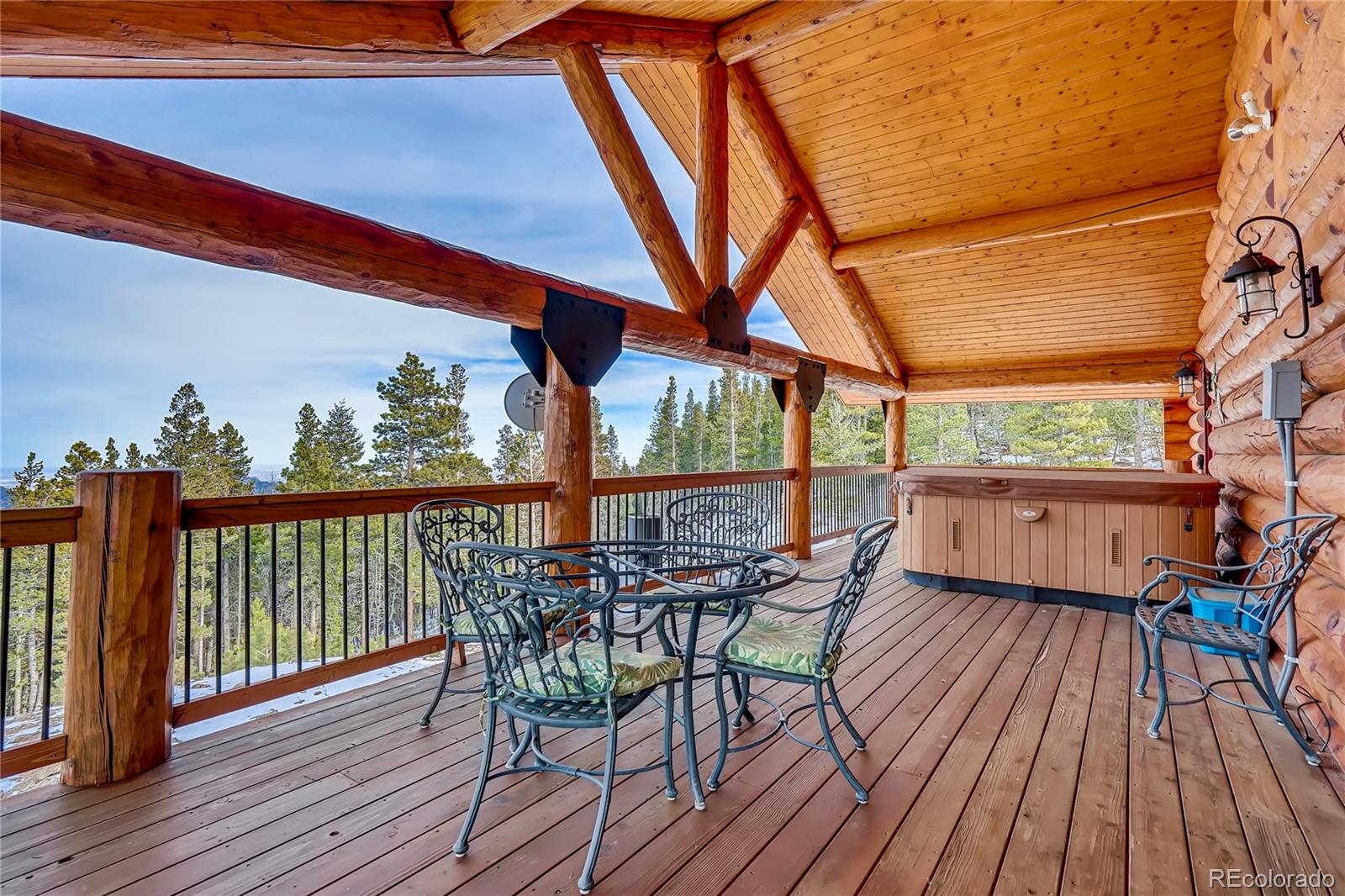11200 Shimley Road Golden, CO 80403 - Photo 25 of 40 a view of a chairs on the roof deck