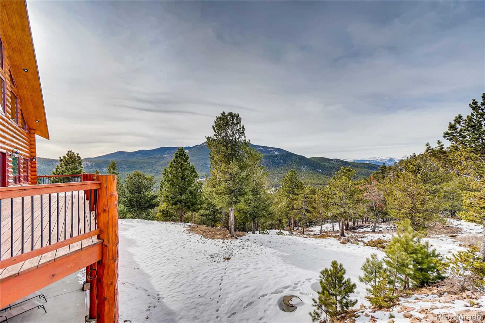 11200 Shimley Road Golden, CO 80403 - Photo 32 of 40 a view of a yard with wooden fence