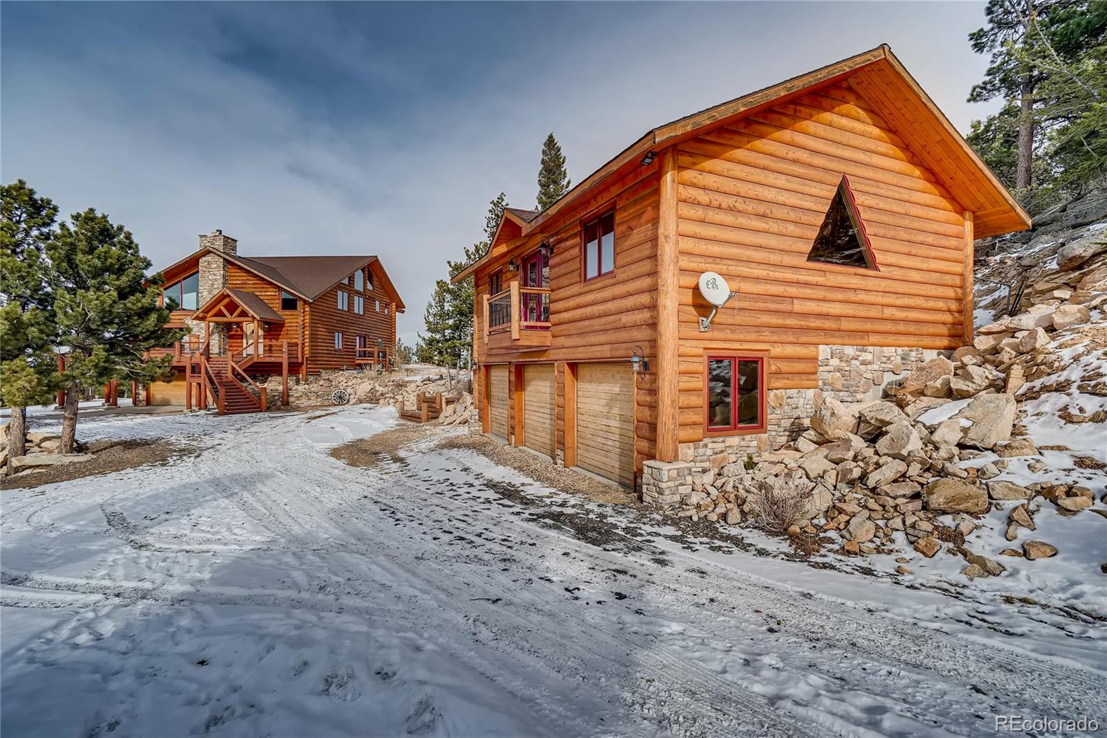 11200 Shimley Road Golden, CO 80403 - Photo 34 of 40 a view of a house with a yard