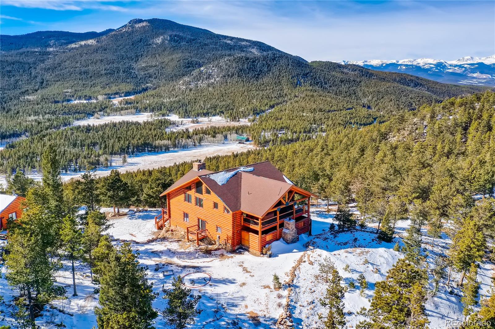 11200 Shimley Road Golden, CO 80403 - Photo 40 of 40 an aerial view of a house with a mountain