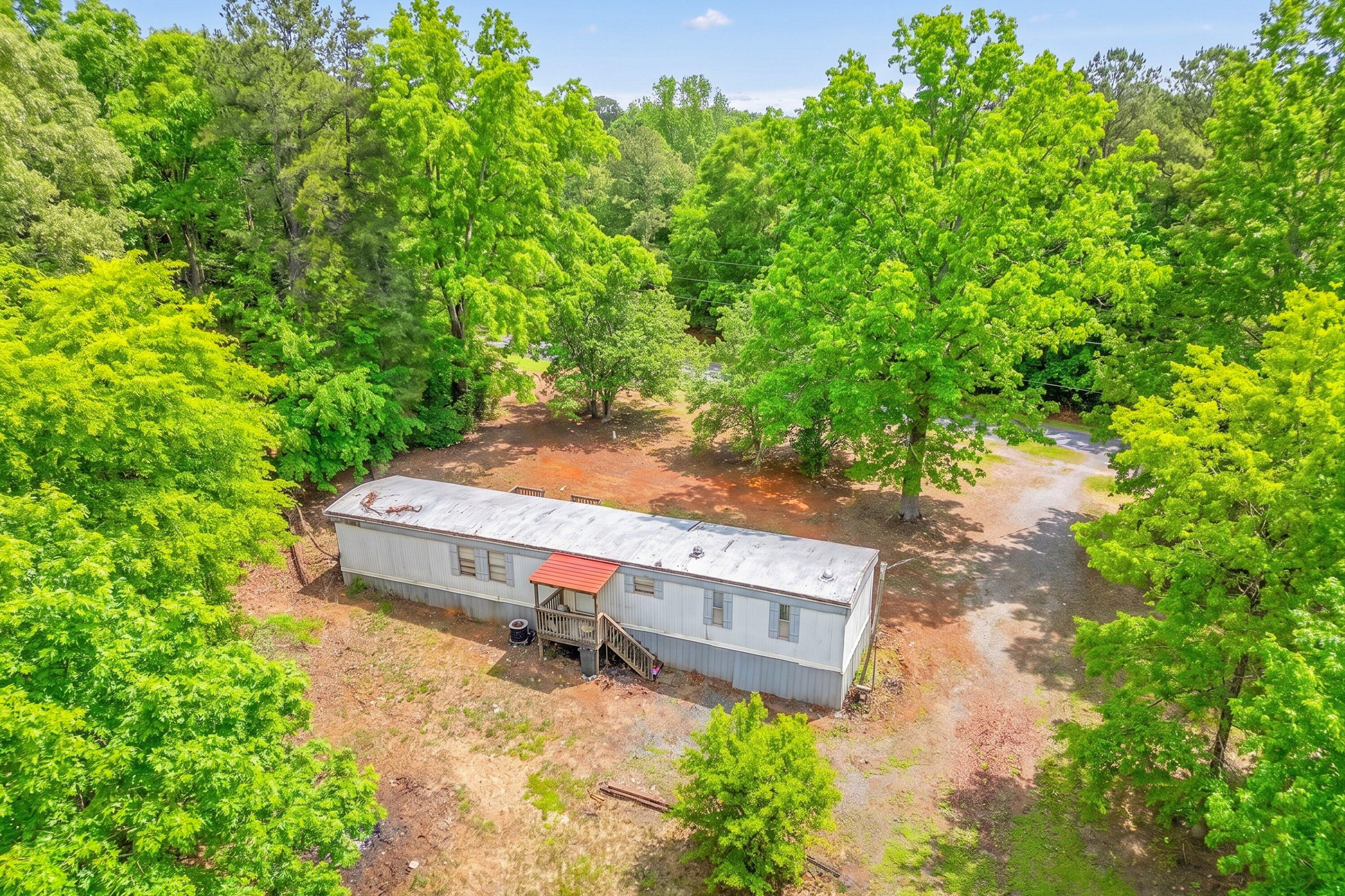 183 Pernello Road Ferrum, VA 24088 - Photo 12 of 24 an aerial view of a house with yard and outdoor seating