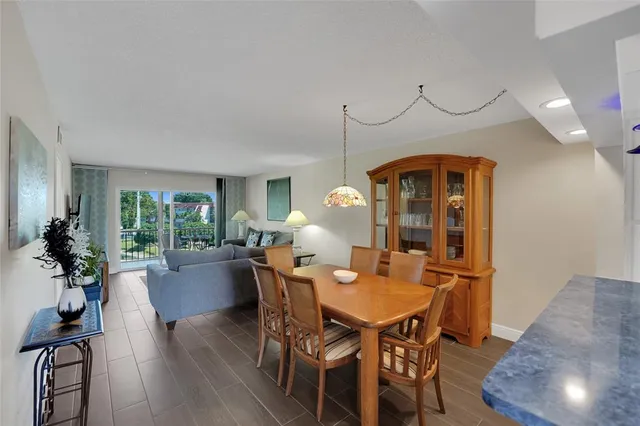 a view of a swimming pool with an outdoor space and seating area