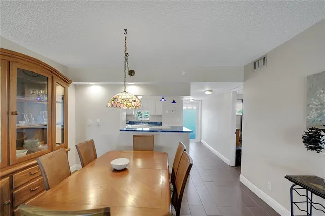 a bedroom with a large bed and a large window