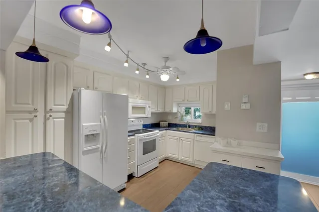 a bedroom with a large bed and a large closet